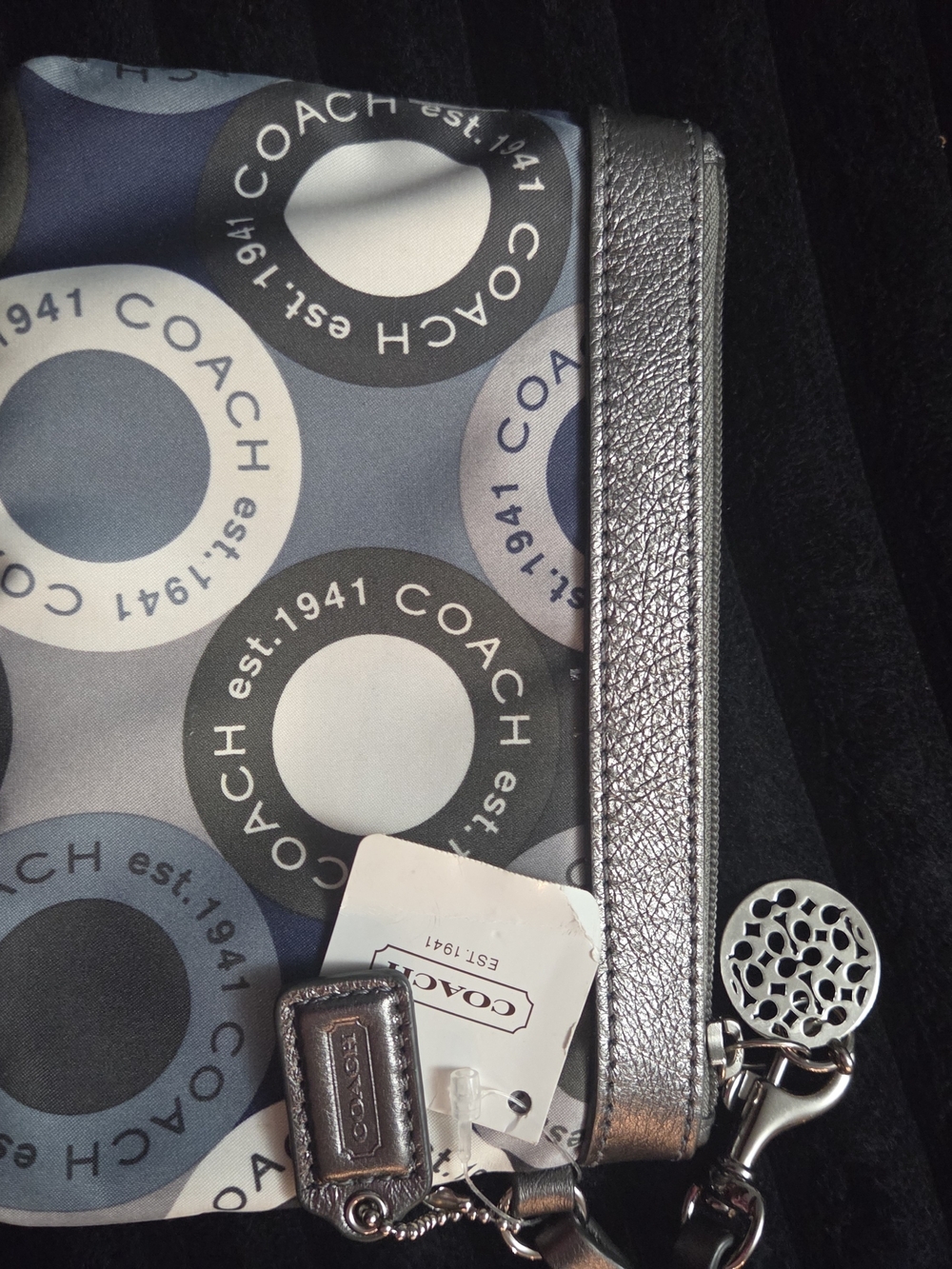 Coach Silver Metallic Wristlet with Blue and Gray Logo Circles